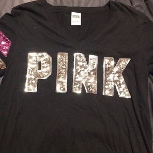 PINK tee shirt. Runs large